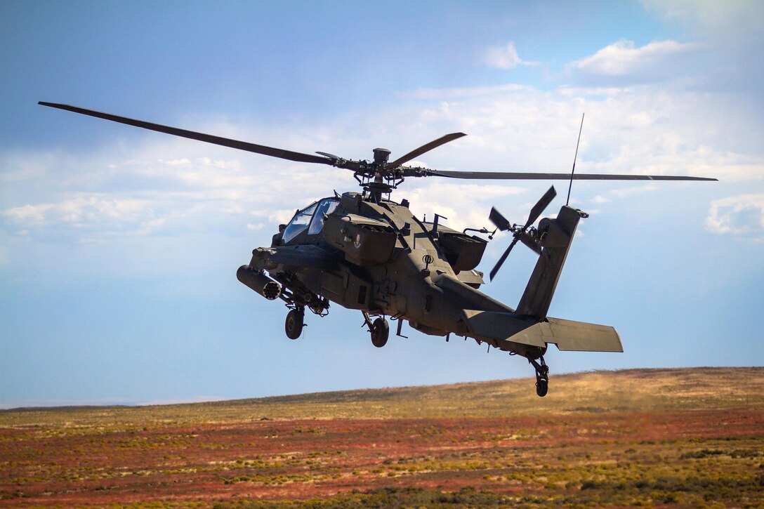 An AH-64E Apache helicopter pilot prepares to land at Orchard Combat Training Center, Idaho, Sept. 29, 2016. The pilot is assigned to the 7th Infantry Division’s 2nd Battalion, 158th Aviation Regiment, 16th Combat Aviation Brigade. Army photo by Capt. Brian Harris