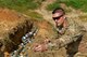 U.S. Air Force Senior Airman Wesley Clayton, 20th Civil Engineer Squadron explosive ordnance disposal journeyman, unrolls detonation cord at Poinsett Electronic Combat Range, Wedgefield, S.C., Sept. 29, 2016. During the semi-annual clearing, EOD Airmen destroyed approximately 160 bomb dummy units to help maintain the range. (U.S. Air Force photo by Airman 1st Class Destinee Sweeney)