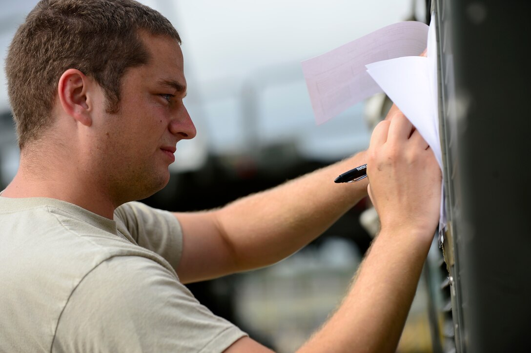 U.S. Air Force Staff Sgt. Stephen Carper, 733rd Logistics Readiness Squadron vehicle maintenance technician, records equipment during an operational readiness exercise at Joint Base Langley-Eustis, Va., Sept. 28, 2016. The exercise assessed JBLE’s capabilities, mission preparedness and serves as a tool to prepare Airmen to deploy short notice. (U.S. Air Force photo by Airman 1st Class Kaylee Dubois)