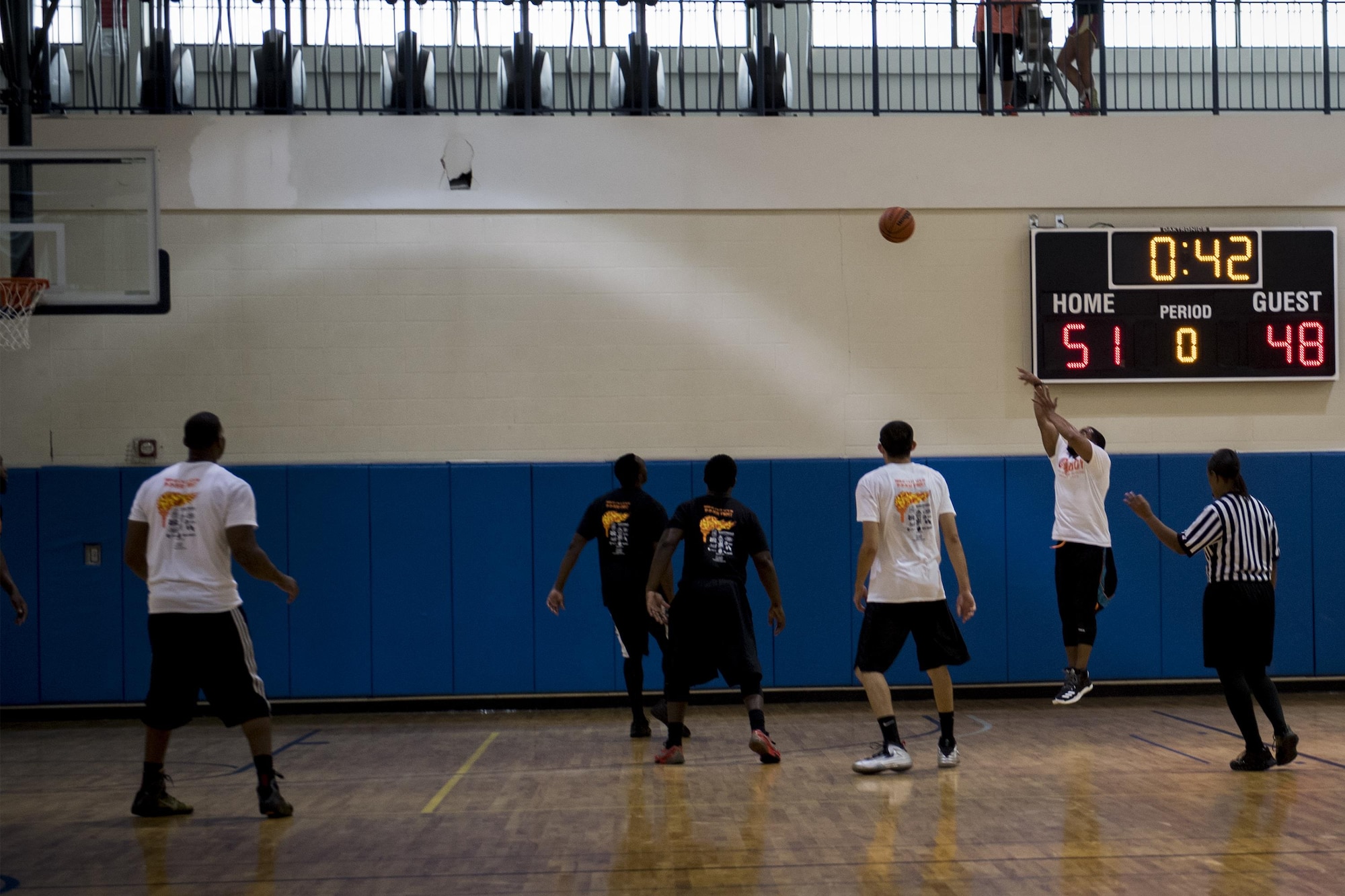 A member of @Moody’s basketball club shoots a 3-pointer during Comprehensive Airman Fitness day, Sept. 30, 2016, at Moody Air Force Base, Ga. The @Moody's basketball club defeated the local college's alumni team 53-48. (U.S. Air Force photo by Airman 1st Class Daniel Snider)