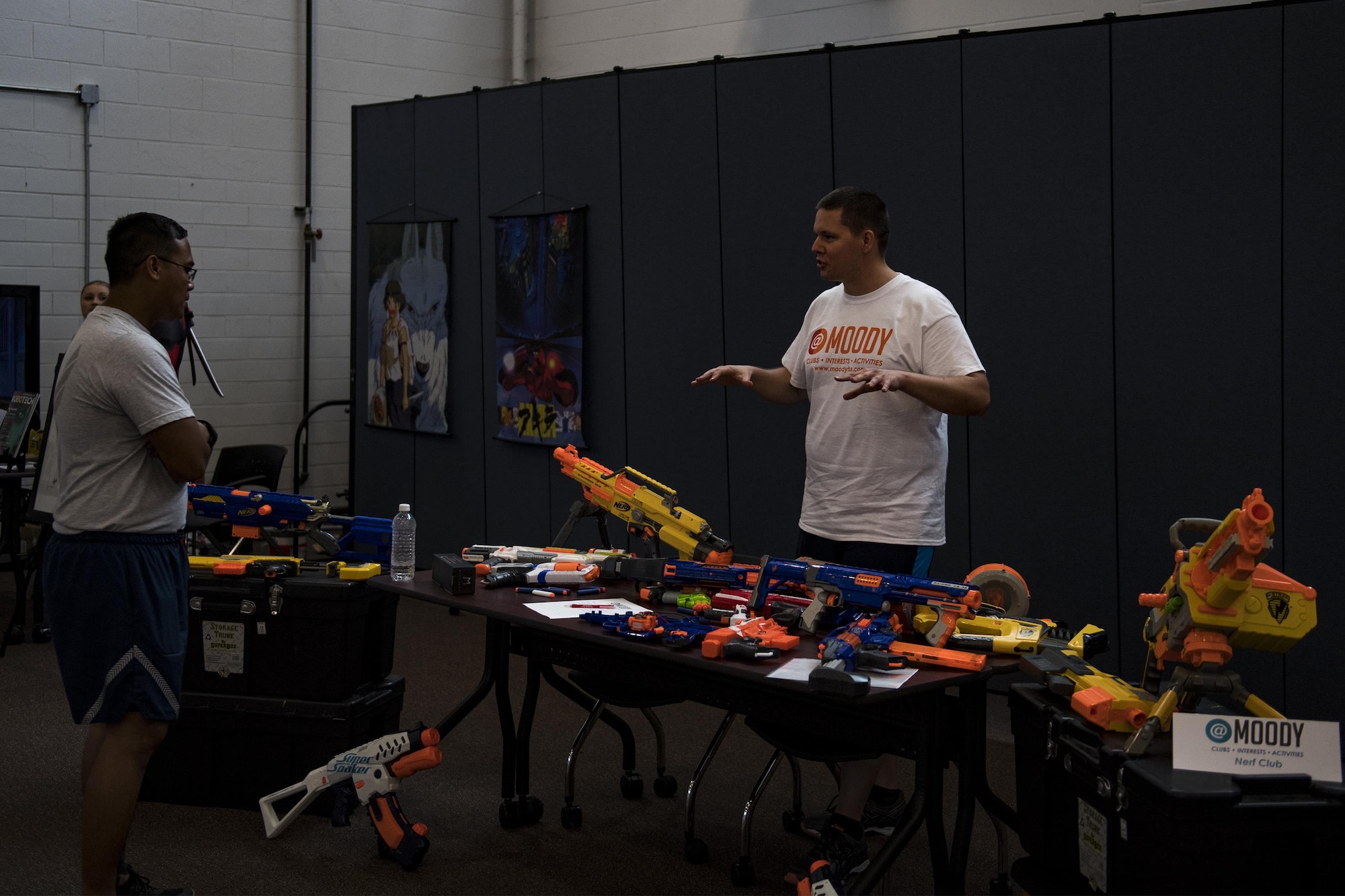 U.S. Air Force Staff Sgt. Kellan Hawks, 23d Aircraft Maintenance Squadron avionics system craftsman, displays his Nerf club to Airmen during Comprehensive Airman Fitness day, Sept. 30, 2016, at Moody Air Force Base, Ga. Many @Moody clubs had the opportunity to display their hobbies in hopes of recruiting like-minded people. (U.S. Air Force photo by Airman 1st Class Daniel Snider)