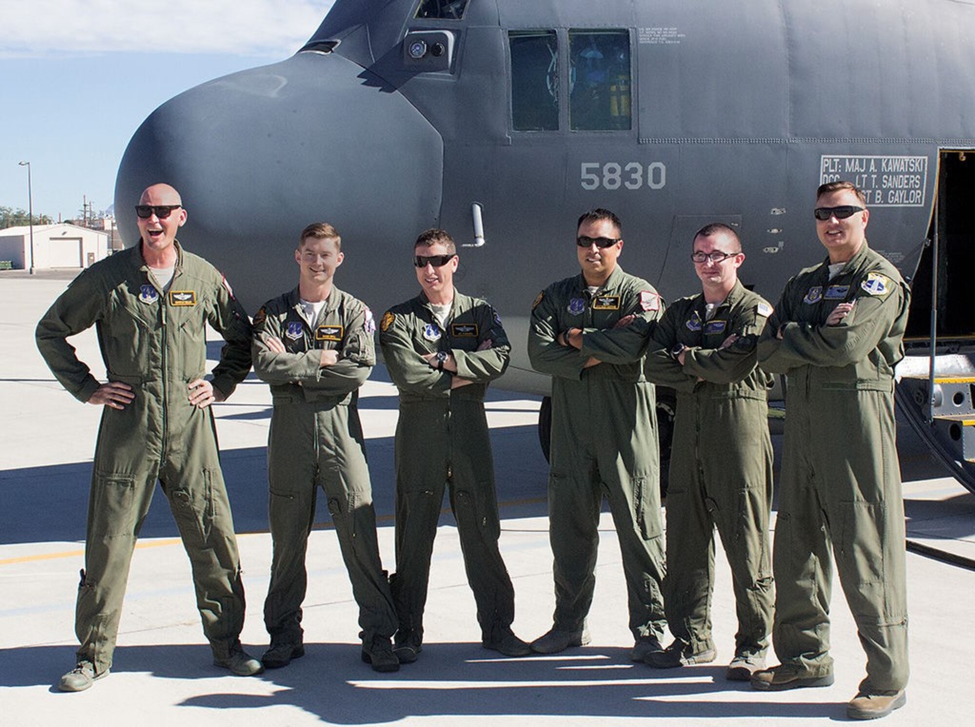 The last active-duty aircrew for the HC-130 P/N King poses for a photo at Kirtland before taking off to bring the plane to Patrick Air Reserve Base, Florida. Crew members are, from left, Maj. Christian Walley, Maj. Sean Bell, Lt. Col. Kit Flanders, Master Sgt. Bobby Martinez, Staff Sgt. Kyle McQuiston and Master Sgt. George Telesh. The King was the last in the active-duty Air Force. Only Reserve and Air National Guard units will use the planes now. (Photo by Bud Cordova)
