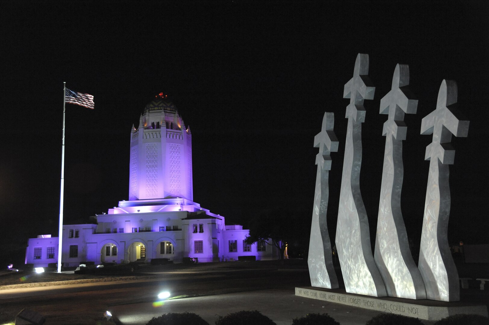 Landmarks at Joint Base San Antonio locations are bathed in purple light every night this month to raise awareness of a problem that impacts lives and can have a detrimental effect on military families as well as mission readiness.
Purple is the color of Domestic Violence Prevention and Awareness Month, which is being observed at JBSA with the theme “Break the Silence, Stop the Violence.”
