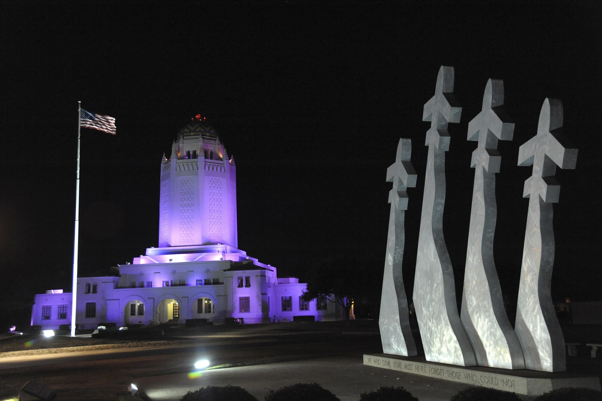 Landmarks at Joint Base San Antonio locations are bathed in purple light every night this month to raise awareness of a problem that impacts lives and can have a detrimental effect on military families as well as mission readiness.
Purple is the color of Domestic Violence Prevention and Awareness Month, which is being observed at JBSA with the theme “Break the Silence, Stop the Violence.”
