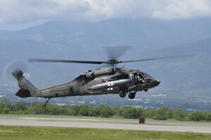 An HH-60L Blackhawk helicopter assigned to Joint Task Force-Bravo’s 1st Battalion, 228th aviation regiment, prepares to launch from Soto Cano Air Base, Honduras, Oct. 4, 2016, to stage at the Grand Cayman Islands to provide airlift capabilities for Hurricane Matthew relief efforts if requested by the U.S. Agency for International Development’s Office of Foreign Disaster Assistance. One hundred members of Joint Task Force-Bravo and Special Purpose Marine Air-Ground Task Force-Southern Command departed Honduras’ Soto Cano Air Base today aboard CH-53E Super Stallion, CH-47 Chinook, and UH-60L Blackhawk helicopters. (U.S. Air Force photo by Staff Sgt. Siuta B. Ika)