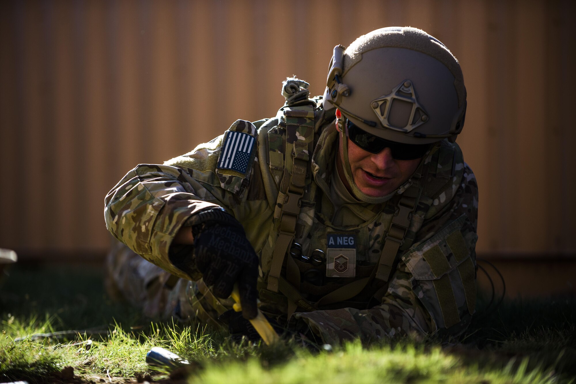 Master Sgt. Jeremy Phillips, 27th Special Operations Civil Engineer Squadron Explosive Ordnance Disposal flight chief, searches for simulated improvised explosive devices during IED training at Melrose Air Force Range, N.M., Sept. 28, 2016. Phillips, along with other experienced EOD members, performed and demonstrated different techniques and ways of thinking for the younger members. (U.S. Air Force photo by Senior Airman Luke Kitterman/Released)