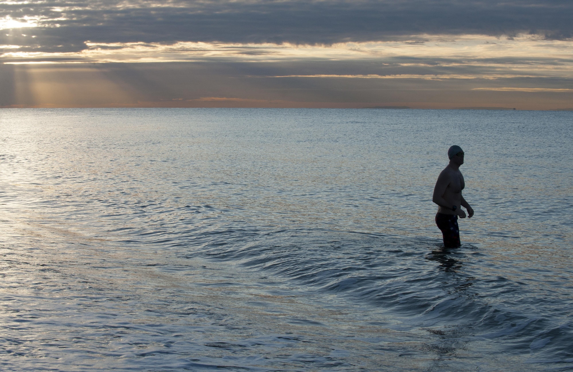 Maj. Casey Bowen, a dermatologist with the 59th Medical Wing at Joint Base San Antonio-Lackland, Texas, steps into the English Channel on the coastline of Folkestone, England, for a practice swim Sept. 23, 2016. Bowen and Maj. Simon Ritchie traveled to England to swim across the English Channel from Dover Harbor to the coastline of France. (DoD News photo/Tech. Sgt. Brian Kimball)