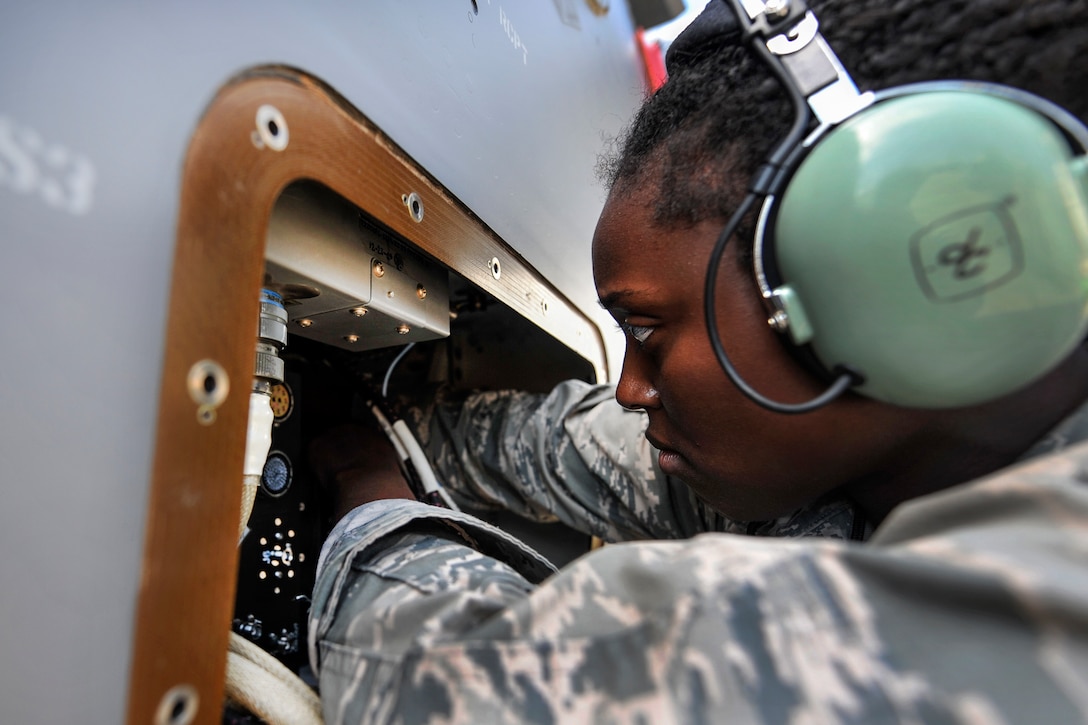 An airman performs maintenance on an electrical circuit board on a CV-22 Osprey tiltrotor aircraft at Hurlburt Field, Fla., Sept. 27, 2016. Air Force photo by Airman 1st Class Joseph Pick