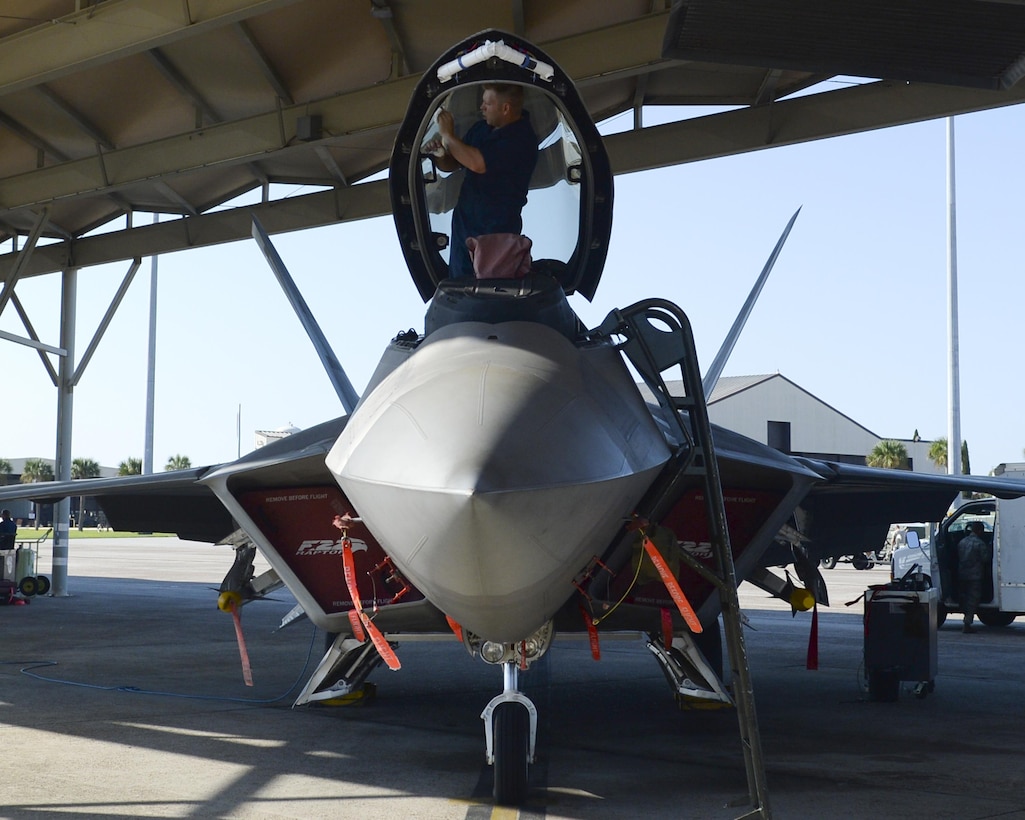 A 44th Fighter Group crew chief inspects the inside of an F-22 Raptor’s cockpit at Tyndall Air Force Base, Fla., Sept. 10, 2016. The mission of the 44th Fighter Group is to train and produce unrivaled 5th generation combat airpower through mission-ready Airmen; this is made possible by the contribution of skilled maintainers who keep the jets mission-ready. (U.S. Air Force photo by Airman 1st Class Cody R. Miller/Released)