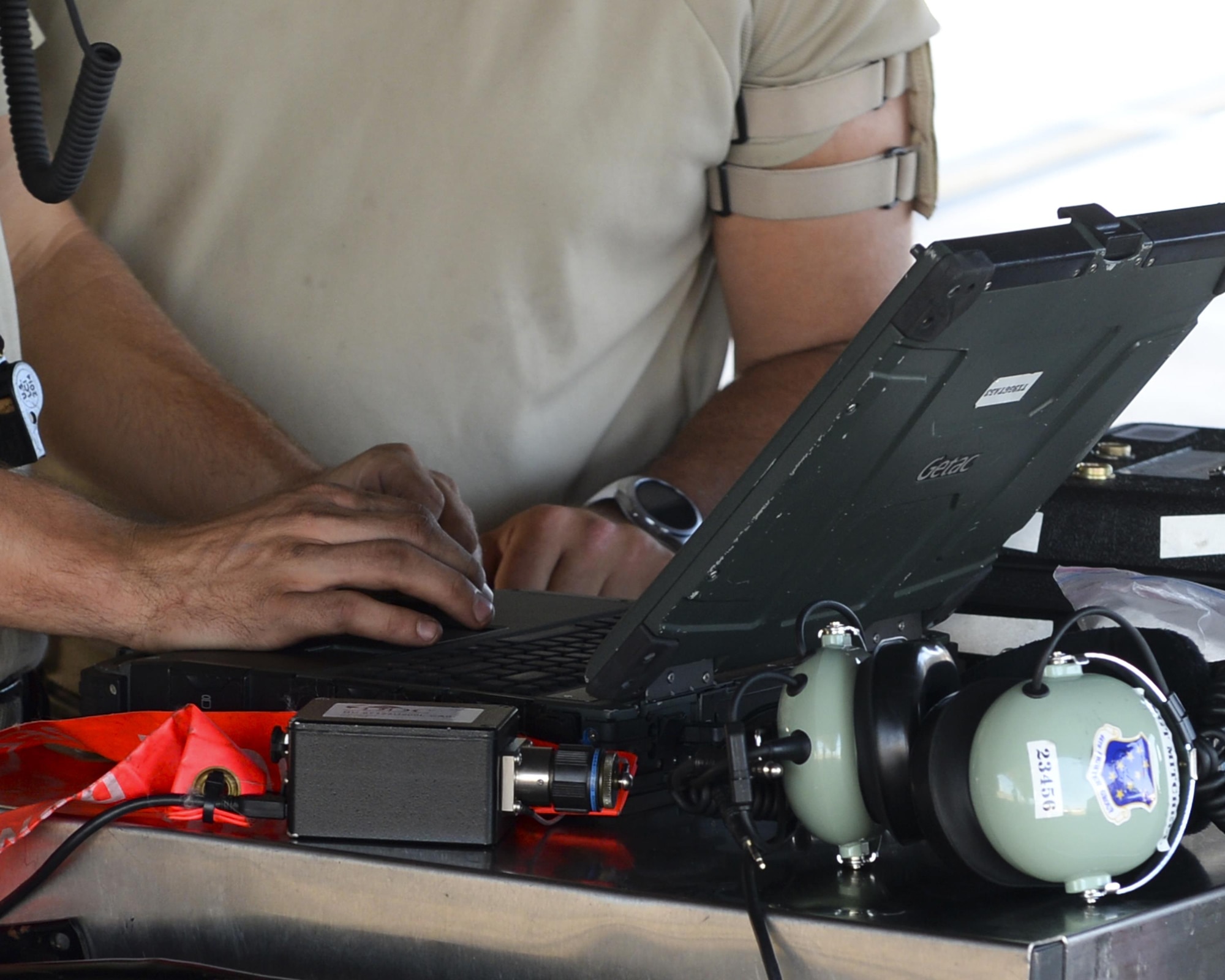 A 44th Fighter Group crew chief inputs diagnostic data on the F-22 Raptor into his laptop on the flight line at Tyndall Air Force Base, Fla., Sept. 10, 2016. The squadrons within the 44 FG are the 44th Maintenance Squadron, 301st Fighter Squadron and 44th Aerospace Medical Flight. The squadrons contain both traditional reservists and active-duty reservists who make the mission happen as part of the total force integration initiative. (U.S. Air Force photo by Airman 1st Class Cody R. Miller/Released)