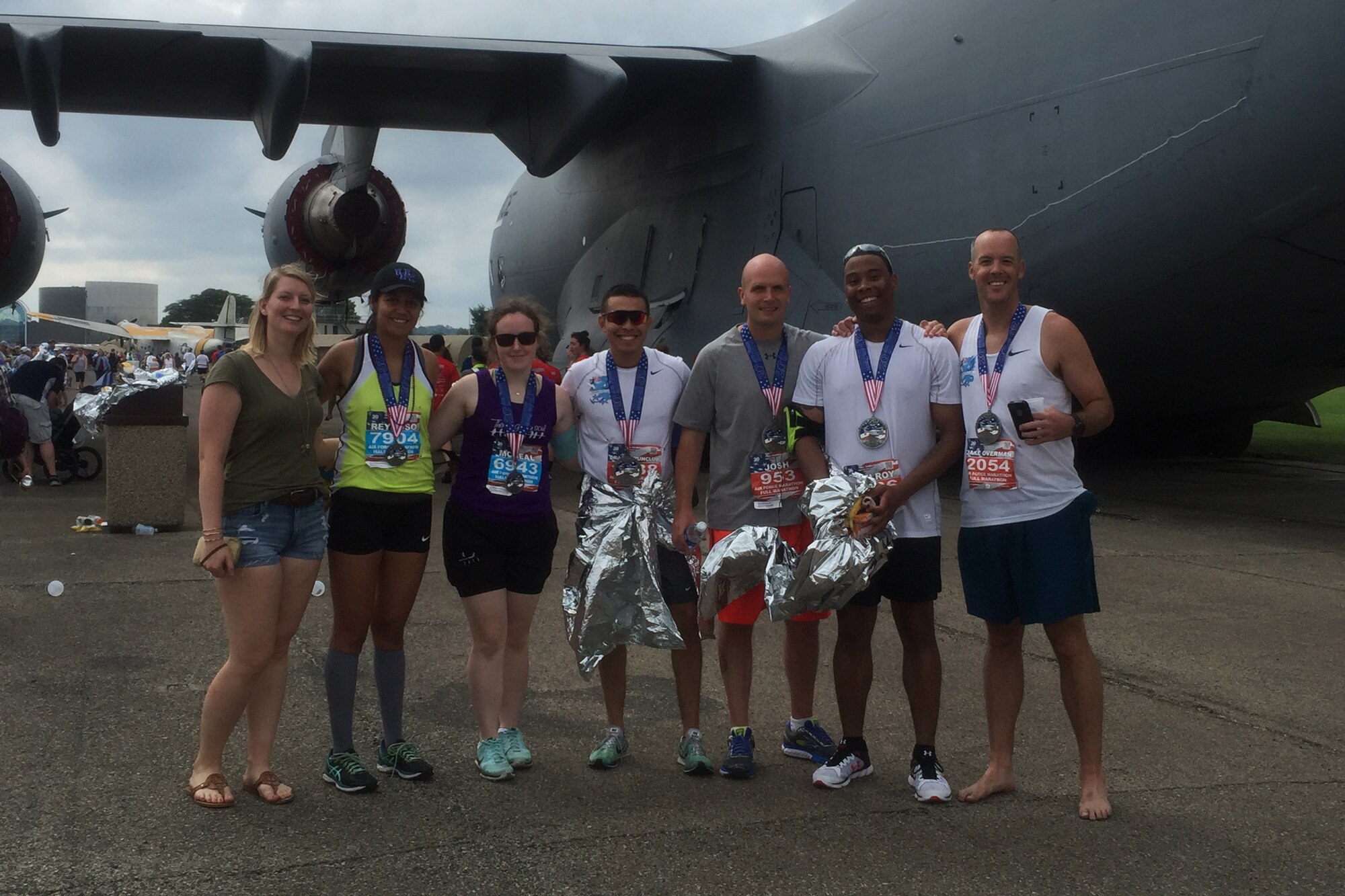 Members of Keesler's Dragon Run Club pose for a photo with other participants following completion of the 20th annual Air Force Marathon, SEpt. 17, 2016, on Wright-Patterson Air Force Base, Ohio. Eight members of Team Keesler participated in the 26.2 mile run. (Courtesy photo)