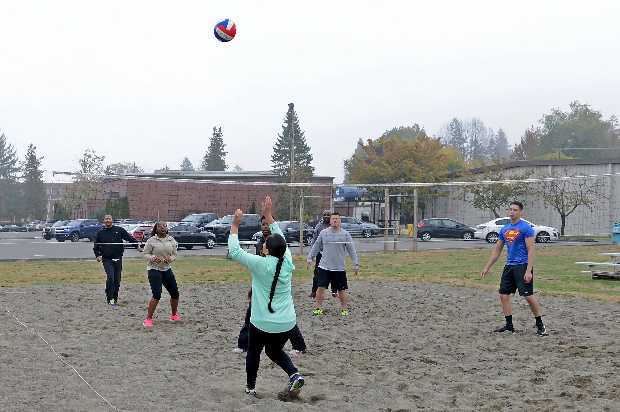 McChord Field Airmen play sand volleyball during the Annual 2016 McChord Field Sports Day event Sept. 30, 2016 at Joint Base Lewis McChord, Wash. The events of the day began with the run and included sand volleyball, basketball, dodgeball, kickball, ultimate frisbee, one pitch softball and a warrior challenge. Squadrons were able to participate in up to three sporting events. (U.S. Air Force photo/Senior Airman Divine Cox)