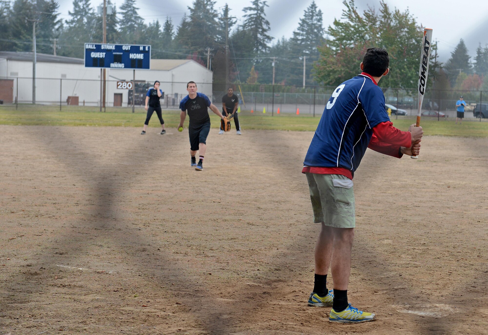 McChord Field Airmen play softball during the Annual 2016 McChord Field Sports Day event Sept. 30, 2016 at Joint Base Lewis McChord, Wash. The events of the day began with the run and included sand volleyball, basketball, dodgeball, kickball, ultimate frisbee, one pitch softball and a warrior challenge. (U.S. Air Force photo/Senior Airman Divine Cox)