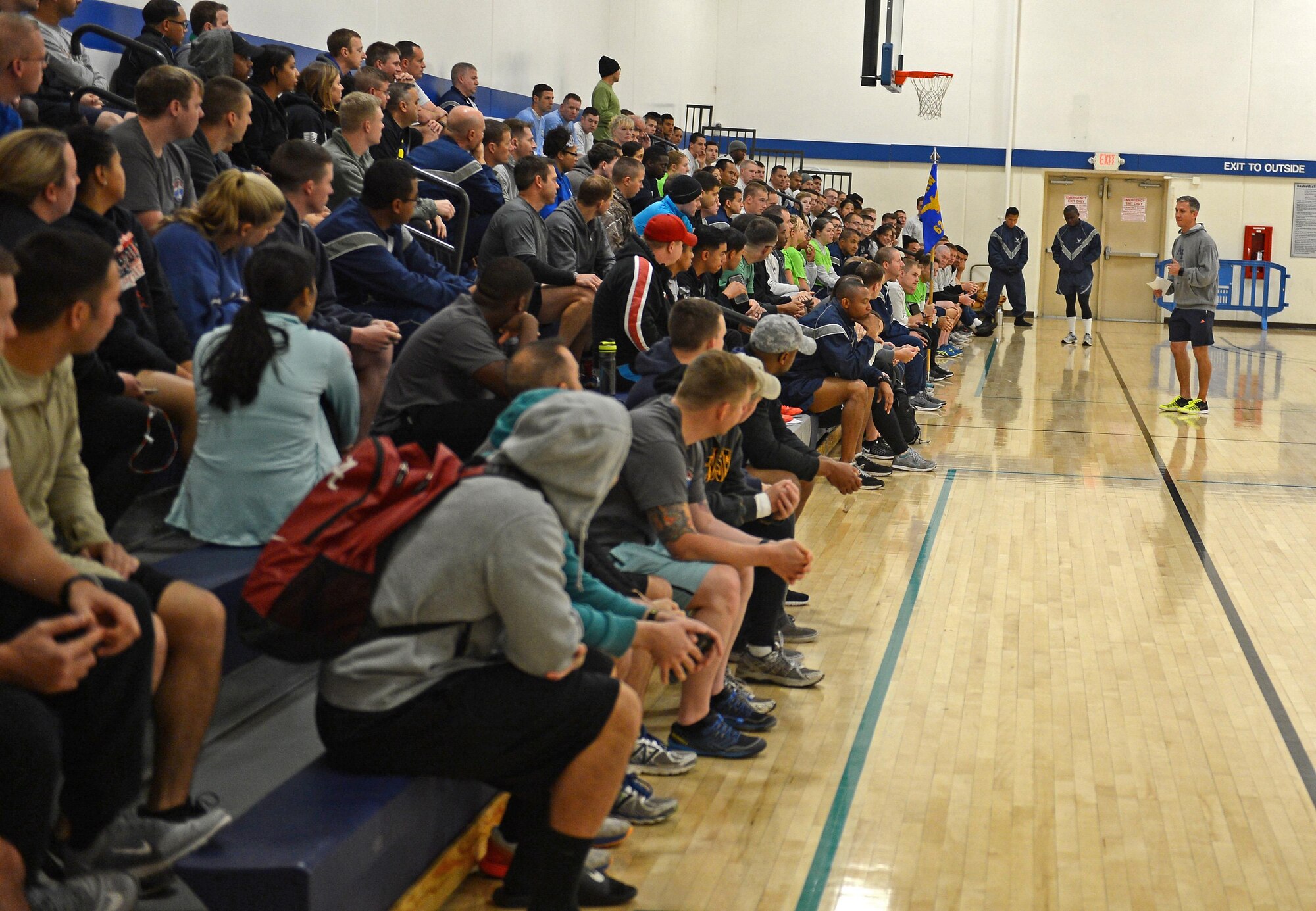 Lt. Col. John McQuade, 627th Air Base Group deputy commander, speaks to Team McChord Airmen during the Annual 2016 McChord Field Sports Day event Sept. 30, 2016 at Joint Base Lewis McChord, Wash. The day started with participants meeting at the McChord Field Fitness Center to sign-in and listen to opening remarks. (U.S. Air Force photo/Senior Airman Divine Cox)