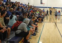 Lt. Col. John McQuade, 627th Air Base Group deputy commander, speaks to Team McChord Airmen during the Annual 2016 McChord Field Sports Day event Sept. 30, 2016 at Joint Base Lewis McChord, Wash. The day started with participants meeting at the McChord Field Fitness Center to sign-in and listen to opening remarks. (U.S. Air Force photo/Senior Airman Divine Cox)