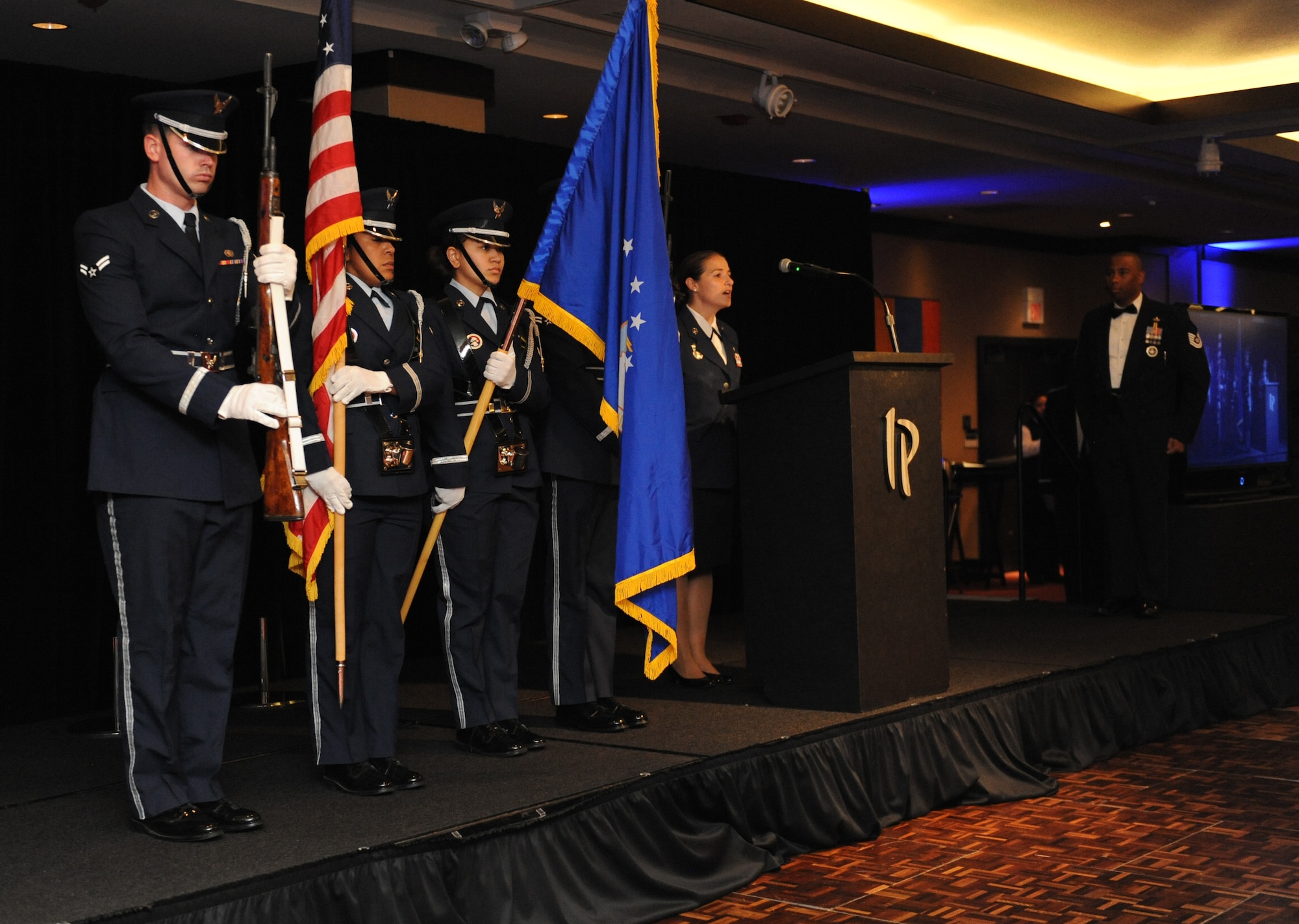 Members of the Keesler Air Force Base Honor Guard present the colors during the playing of the national anthem during the Keesler Air Force Ball at the Imperial Palace Casino Sept. 24, 2016, Biloxi, Miss. The event was sponsored by the Air Force Association John C. Stennis Chapter #332 to celebrate the Air Force’s 69th birthday and the base’s 75th anniversary. (U.S. Air Force photo by Kemberly Groue/Released)