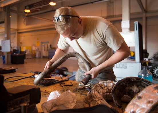 Senior Airman Miles Shepperd, an aerospace ground equipment journeyman with the 1st Special Operations Maintenance Squadron, repairs an exhaust pipe on a munitions handling unit at the AGE hangar on Hurlburt Field, Fla., Oct. 3, 2106. AGE Airmen routinely repair flightline support equipment such as generators and air condition carts. (U.S. Air Force photo by Senior Airman Krystal M. Garrett) 