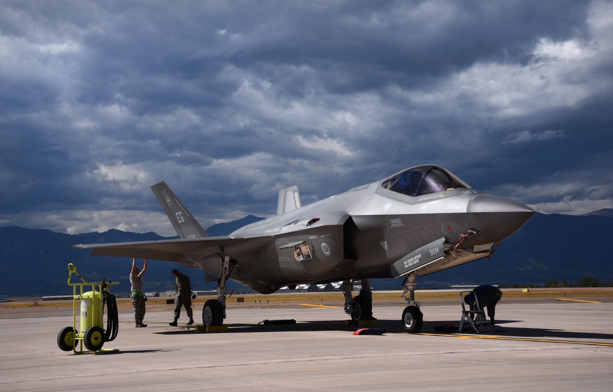 PETERSON AIR FORCE BASE, Colo. – Avionic technicians and crew chiefs perform a post-operation servicing to an F-35A Lightning II assigned to the 58th Fighter Squadron at Eglin Air Force Base, Fla., while on the flightline at Peterson AFB, Colo., Sept. 30, 2016. Four F-35s landed at Peterson AFB to execute a flyover during the U.S. Air Force Academy versus the U.S. Naval Academy football game at USAFA. (U.S. Air Force photo by Airman 1st Class Dennis Hoffman)