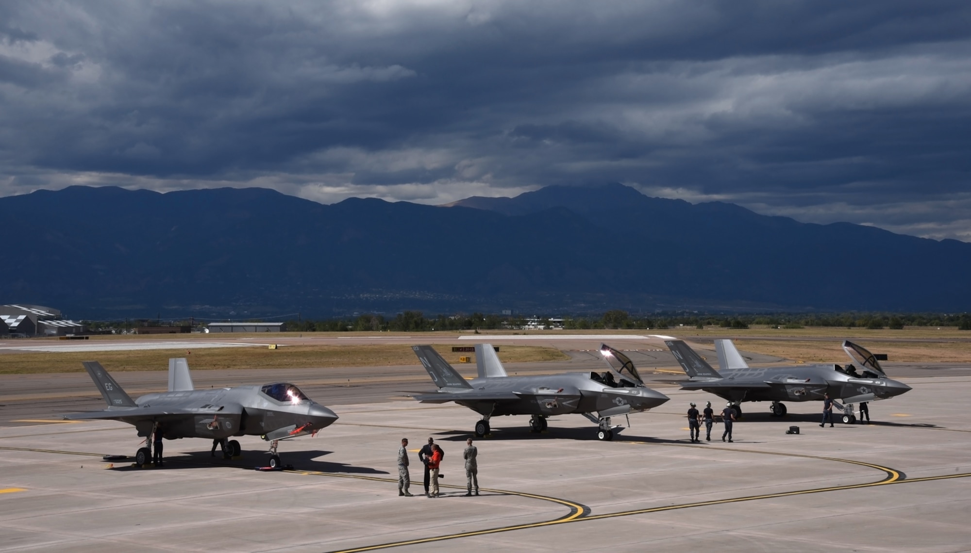PETERSON AIR FORCE BASE, Colo. – An Air Force F-35A Lightning II, assigned to the 58th Fighter Squadron at Eglin Air Force Base, Fla., and two Navy F-35C Lightning II assigned to the Strike Fighter Squadron 101, also at Eglin AFB, sit on the flightline at Peterson AFB, Colo., Sept. 30, 2016. The F-35 combines 5th generation fighter aircraft characteristics, including advanced stealth, integrated avionics, sensor fusion and superior logistics support with the most powerful and comprehensive integrated sensor package of any fighter aircraft in history. (U.S. Air Force photo by Airman 1st Class Dennis Hoffman)