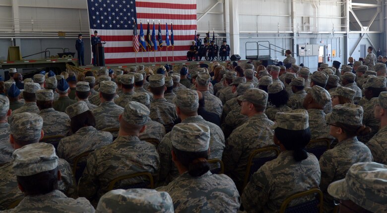 Bomber Airmen prepare for the beginning of a change of command ceremony at the weapons load trainer at Barksdale AFB, La., Oct. 4, where U.S. Air Force Maj. Gen. became the 53rd commander of the Eighth Air Force. (U.S. Air Force photo by Senior Airman Curtis Beach)