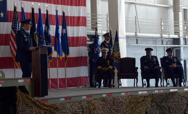 From left, U.S. Air Force Gen. Robin Rand, commander of Air Force Global Strike Command, officiates the Eighth Air Force change of command ceremony at Barksdale Air Force Base, La., Oct. 4. Maj. Gen. Thomas Bussiere, far right, took command from Maj. Gen. Richard Clark, second from right, to oversee the Air Force's B-1, B-2 and B-52 bomber fleets. (U.S. Air Force photo by Senior Airman Curtis Beach) 