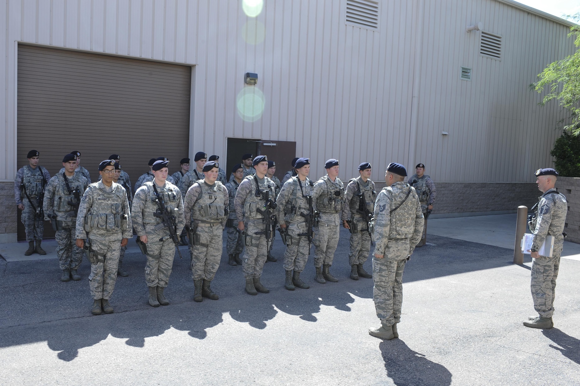 U.S. Airmen from the 355th Security Forces Squadron participate in a guard mount formation at Davis-Monthan Air Force Base, Ariz., Sept. 29, 2016. The 355th SFS mission is to protect, defend, and fight to enable Air Force, joint and coalition mission success.  (U.S. Air Force photo by Airman 1st Class Mya M. Crosby)