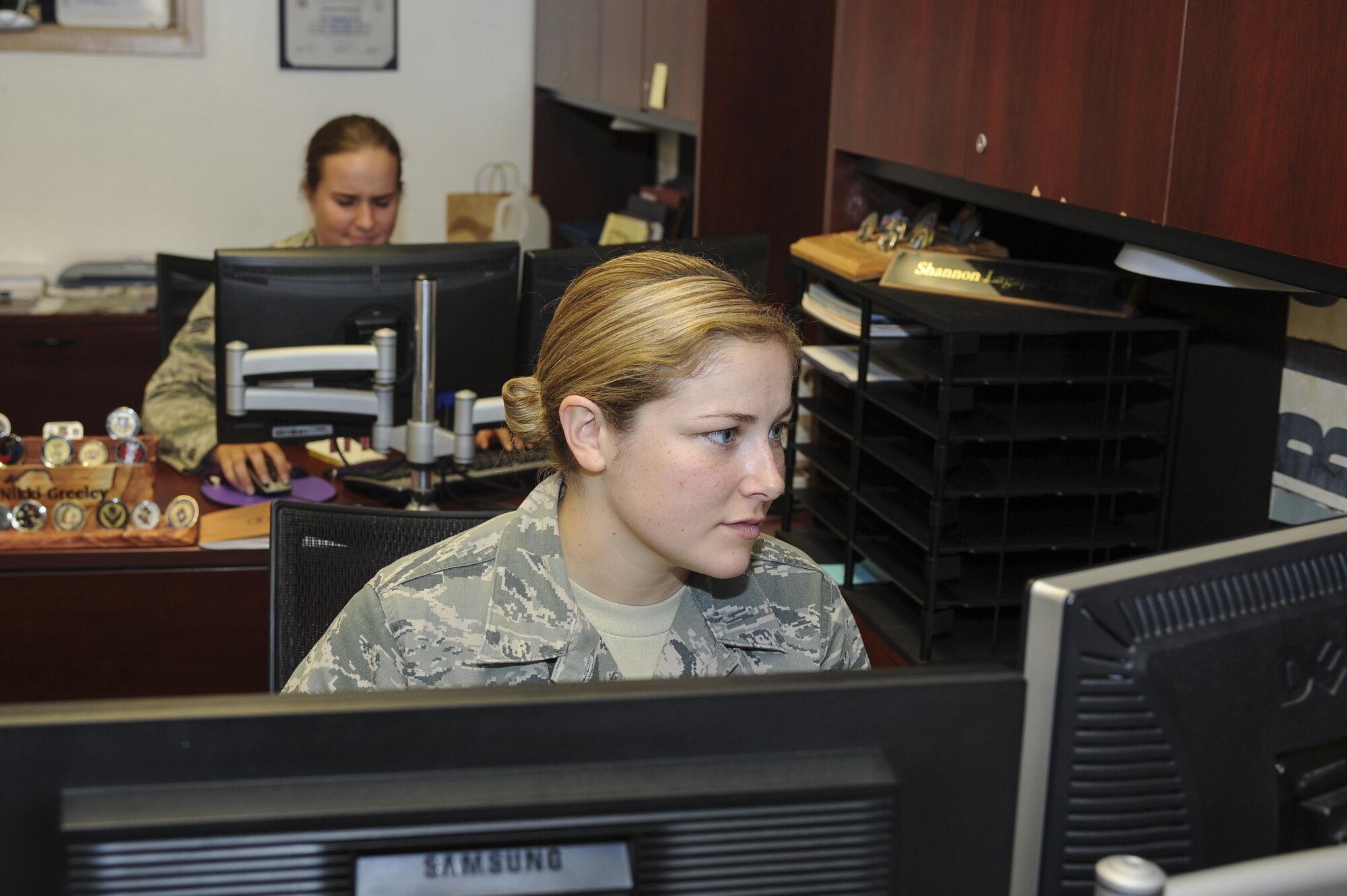 U.S. Air Force Senior Airman Shannon Lagapa-Talbott, 355th Security Forces Squadron commander support staff personnel, update records at Davis-Monthan Air Force Base, Ariz., Sept. 29, 2016. The 355th SFS consists of over 300 military and civilian personnel. (U.S. Air Force photo by Airman 1st Class Mya M. Crosby)