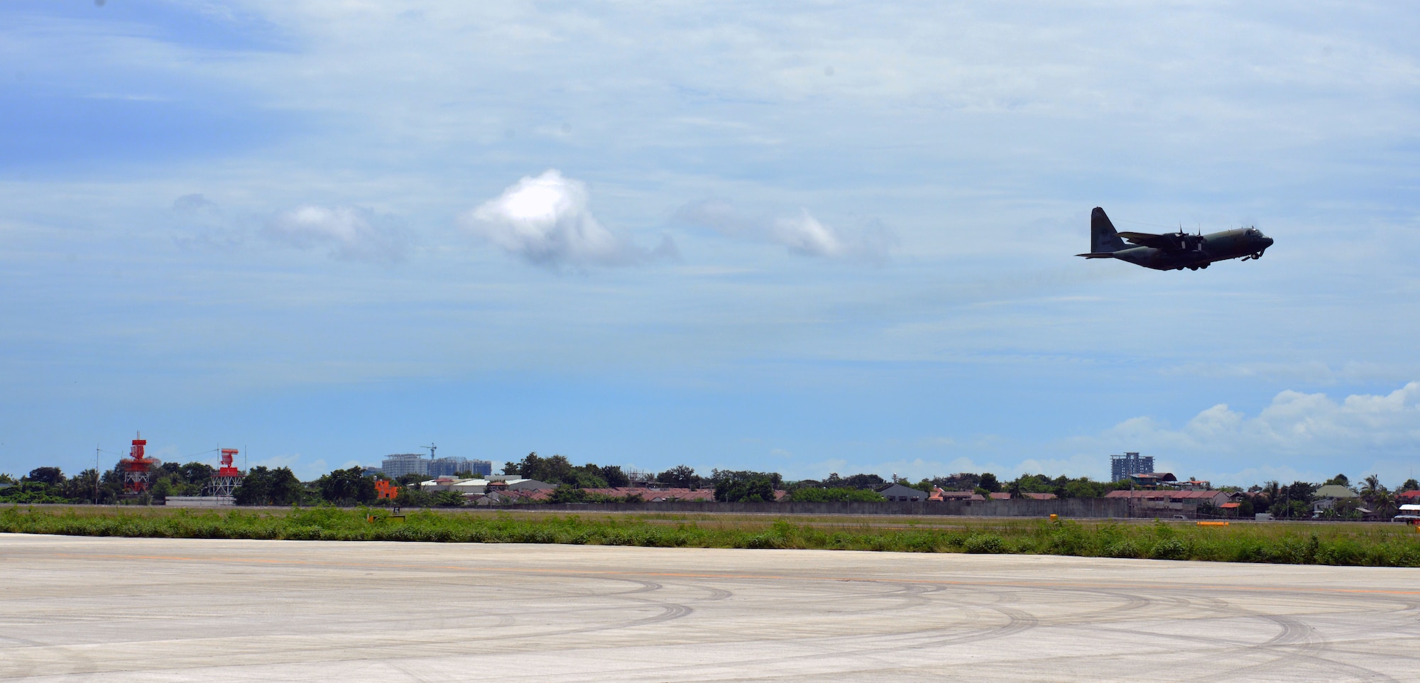 A Philippine Air Force C-130, loaded with simulated casualties, takes off during a mass casualty response exercise here during the current iteration of a rotational Air Contingent at Brigadier General Benito N Ebuen Air Base, Philippines, Sept. 29, 2016. The Air Contingent is helping build the capacity of the Philippine Air Force and increases joint training, promotes interoperability and provides greater and more transparent air and maritime situational awareness to ensure safety for military and civilian activities in international waters and airspace. Its missions include air and maritime domain awareness, personnel recovery, combating piracy, and assuring access to the air and maritime domains in accordance with international law. (U.S. Air Force photo by Capt. Mark Lazane)
