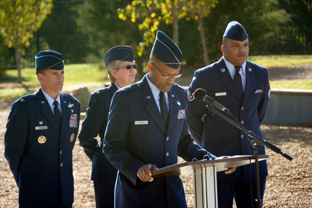 U.S. Air Force Director of Staff, Joint Force Headquarters, North Carolina Air National Guard, Brig. Gen. Clarence Ervin, honors members who have passed in front of family, friends, and Airmen at the North Carolina Air National Guard (NCANG) Base, Charlotte Douglas International Airport, Oct. 2, 2016. Additional names of members who’ve passed are memorialized each year as a lasting tribute to those individuals who have helped establish the proud tradition upon which the NCANG is built. (U.S. Air National Guard photo by Staff Sgt. Laura Montgomery)