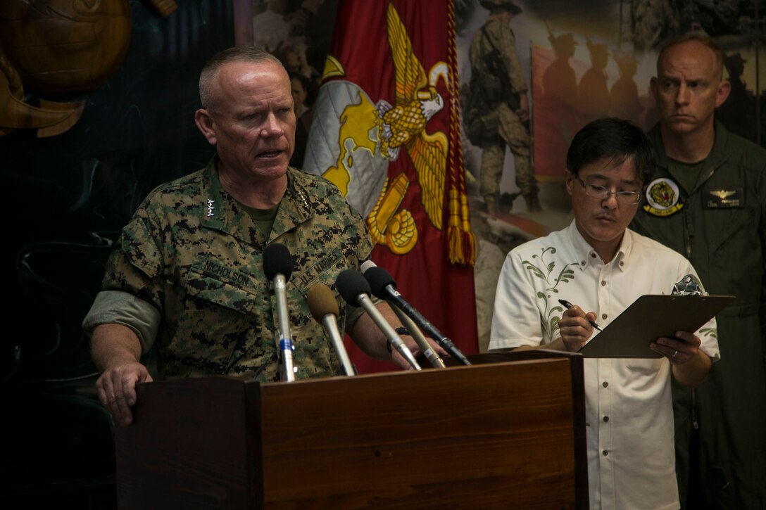 Lt. Gen. Lawrence D. Nicholson announces the resumption of AV-8B Harrier flight operations in Japan during a press conference Oct. 5, 2016 on Camp Foster, Okinawa, Japan following a Harrier mishap that occurred approximately 115 nautical miles off the coast of Okinawa, Sept. 22. III Marine Expeditionary Force directed an operational pause following the incident.  Squadrons and maintenance personnel reviewed their standard operating procedures, safety of flight procedures, technical procedures, inspecting material readiness and host of other activities during the pause in operations. It was determined that all squadron aircraft have been found safe to resume flights, Oct. 7.  Nicholson, from Toronto, Canada, is the Okinawa Area Coordinator and commanding general for III MEF. (U.S. Marine Corps photo by Cpl. Douglas Simons/Released)