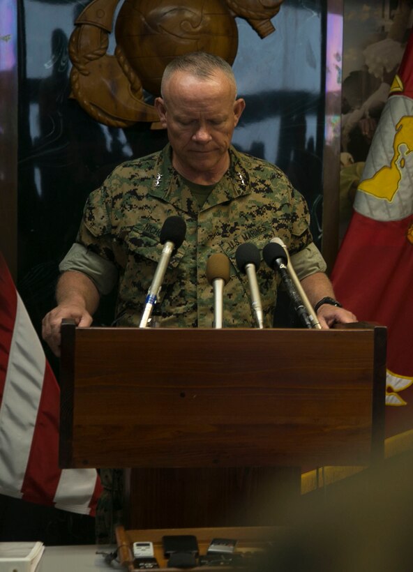 Lt. Gen. Lawrence D. Nicholson announces the resumption of AV-8B Harrier flight operations in Japan during a press conference Oct. 5, 2016 on Camp Foster, Okinawa, Japan following a Harrier mishap that occurred approximately 115 nautical miles off the coast of Okinawa, Sept. 22. III Marine Expeditionary Force directed an operational pause following the incident.  Squadrons and maintenance personnel reviewed their standard operating procedures, safety of flight procedures, technical procedures, inspecting material readiness and host of other activities during the pause in operations. It was determined that all squadron aircraft have been found safe to resume flights, Oct. 7.  Nicholson, from Toronto, Canada, is the Okinawa Area Coordinator and commanding general for III MEF. (U.S. Marine Corps photo by Cpl. Douglas D. Simons /Released)