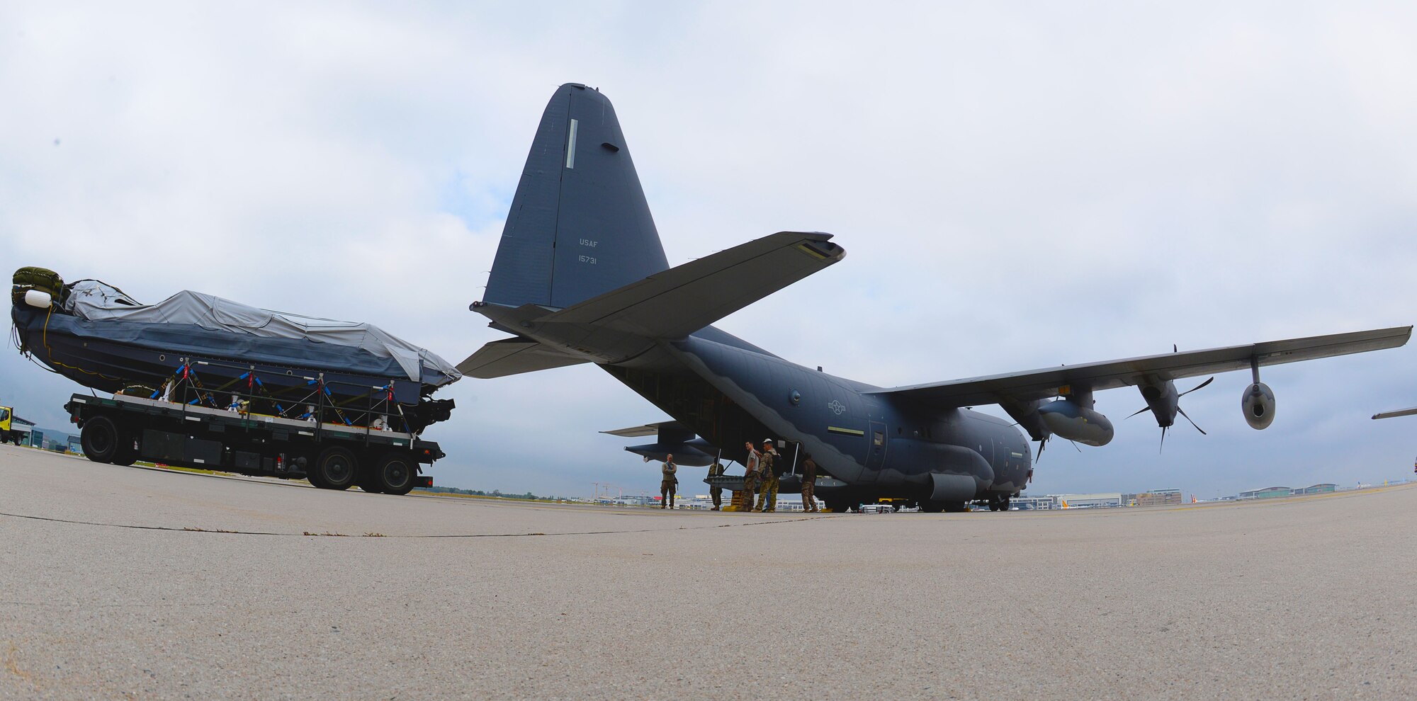 A Rigid Inflatable Boat is loaded onto an MC-130J Commando II in preparation for a Maritime Craft Aerial Delivery drop Sept. 26, 2016, at Stuttgart Air Base, Germany. Two of three MC-130J Commando IIs from the 67th Special Operations Squadron were loaded for MCADS drops in participation with the 2016 Night Hawk exercise. (U.S. Air Force photo by Senior Airman Justine Rho) 