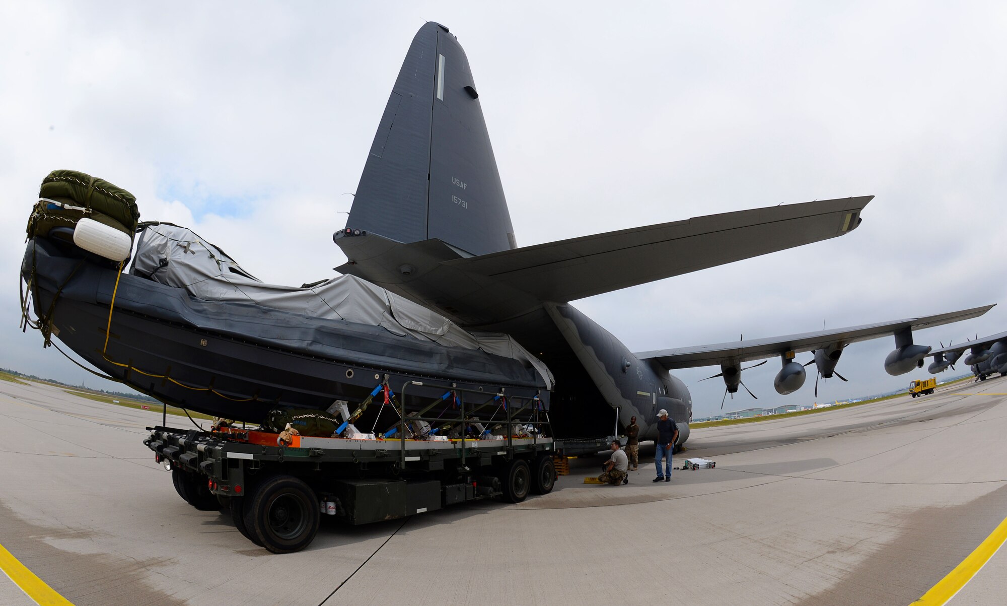 A Rigid Inflatable Boat is loaded onto an MC-130J Commando II in preparation for a Maritime Craft Aerial Delivery drop Sept. 26, 2016, at Stuttgart Air Base, Germany. Two of three MC-130J Commando IIs from the 67th Special Operations Squadron were loaded for MCADS drops in participation with the 2016 Night Hawk exercise. (U.S. Air Force photo by Senior Airman Justine Rho) 