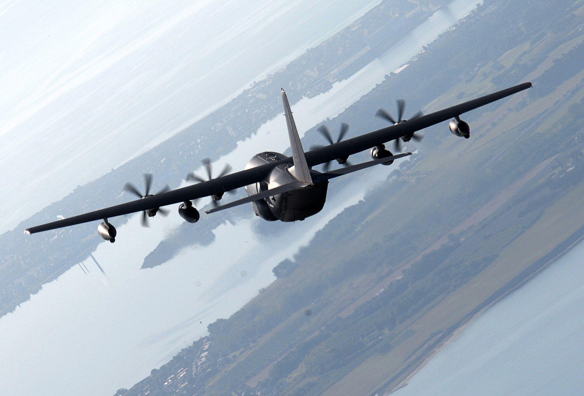 A U.S. Air Force MC-130J Commando II assigned to the 67th Special Operation Squadron flies over the drop zone near the Little Belt Strait in Denmark Sept. 27, 2016. The aircraft was one of three C-130s participating in the 2016 Night Hawk exercise testing joint force capabilities between Airmen, U.S. Navy Special Warfare Combatant-Craft crewmen and Danish air commandos. (U.S. Air Force photo by Senior Airman Justine Rho)