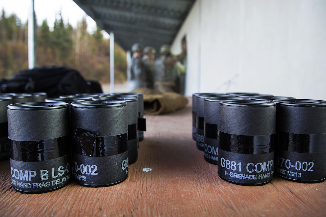 Canisters containing M67 fragmentation grenades are ready to be issued to soldiers for a live-fire training exercise at Kraft Range at Joint Base Elmendorf-Richardson, Alaska, Sept. 29, 2016. The soldiers are assigned to the 25th Infantry Division’s Delta Company, 1st Battalion, 501st Parachute Infantry Regiment, and threw live hand grenades to hone their proficiency. Air Force photo by Alejandro Pena