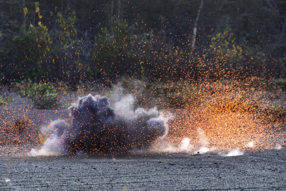 A M67 fragmentation grenade explodes during a live-fire training exercise at Kraft Range at Joint Base Elmendorf-Richardson, Alaska, Sept. 29, 2016. Air Force photo by Alejandro Pena