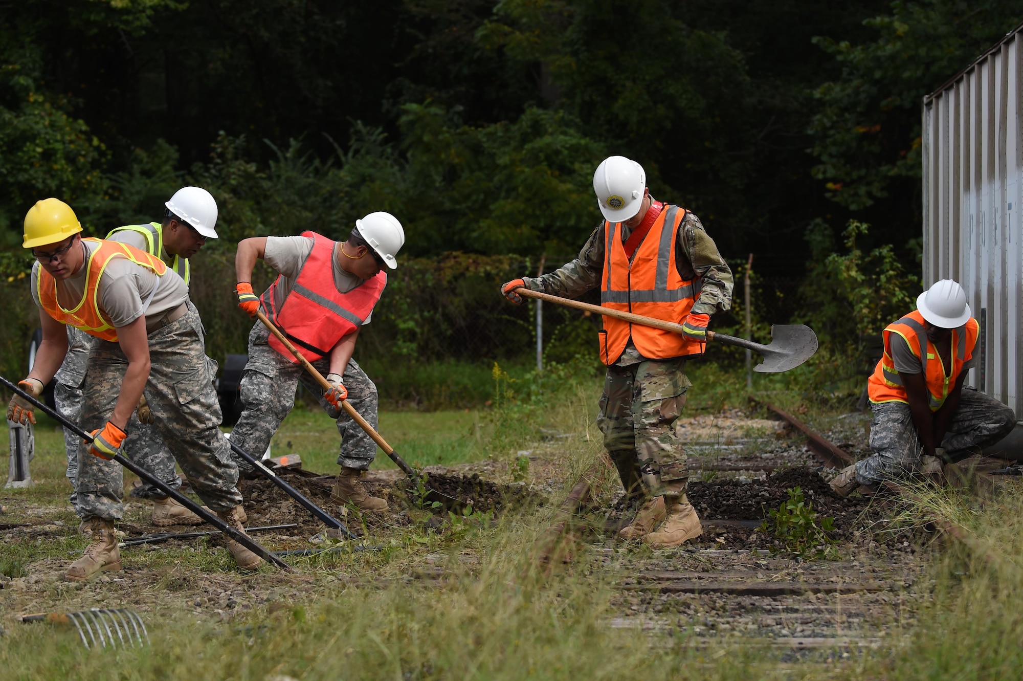 U.S. Army Soldiers with the 757th Expeditionary Rail Command conduct rail maintenance during field training for the railway planning and advisory course at Joint Base Langley-Eustis, Va., Oct. 4, 2016. The students took the class as part of a re-classing within the Army rail career field. (U.S. Air Force photo by Staff Sgt. Natasha Stannard)