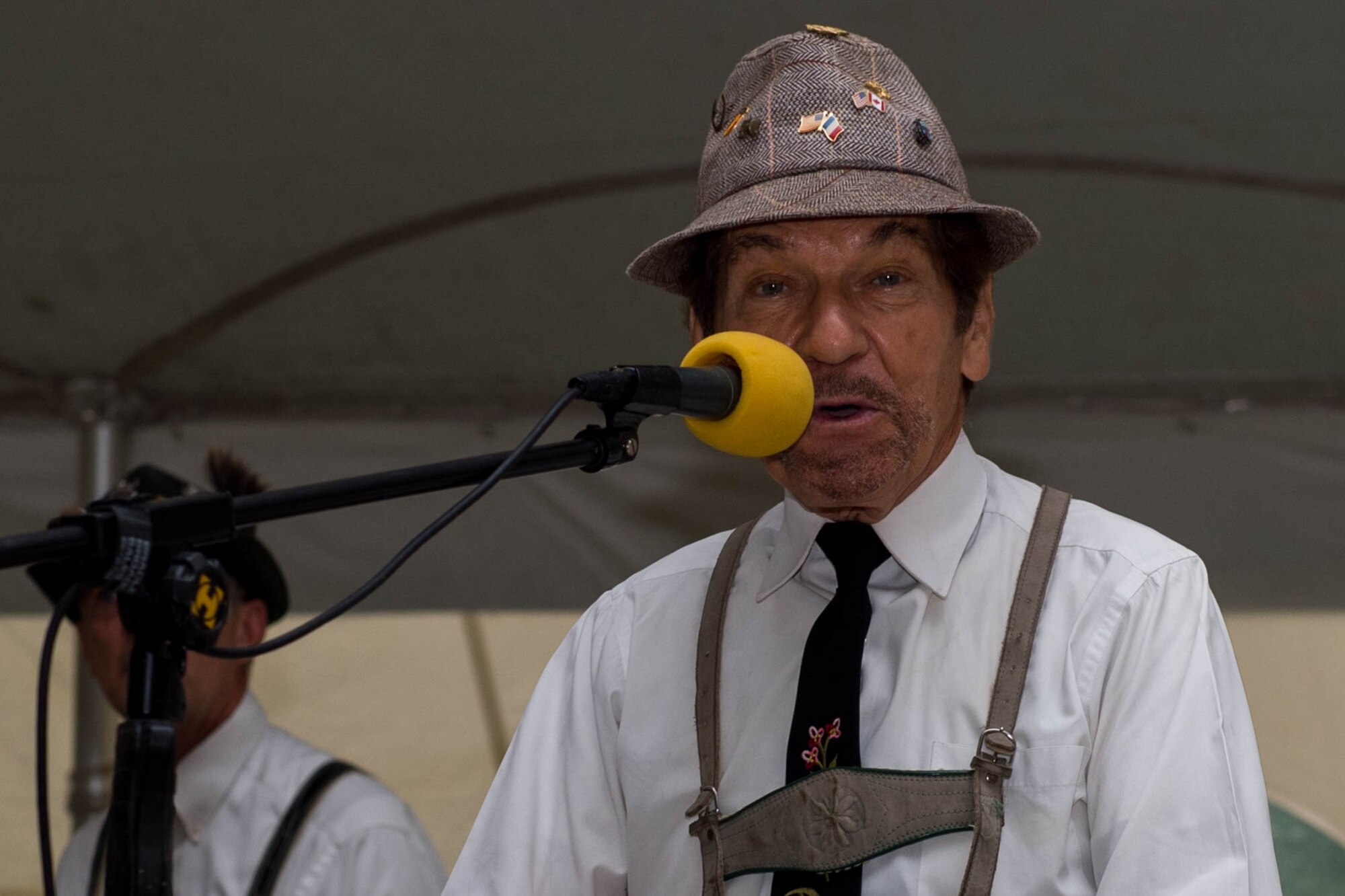 Marc Marique, The Happy Dutchman keyboard and yodeler, performs a song during the Oktoberfest celebration at Joint Base Langley-Eustis, Va., Sept. 30, 2016. The event was held to boost morale and camaraderie amongst the JBLE community. (U.S. Air Force photo by Airman 1st Class Derek Seifert)