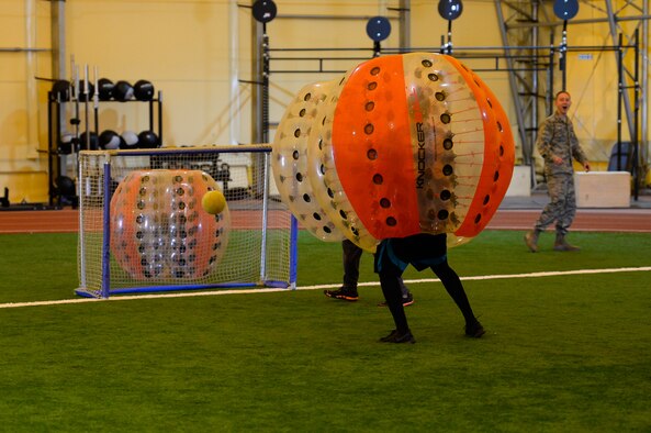 A 50th Contracting Squadron member scores a goal in a knockerball game against the 8th Space Warning Squadron, Detachment 1 during the 2016 Combined Federal Campaign kick-off event at Schriever Air Force Base, Colorado, Tuesday, Oct. 4, 2016. The event gave members an opportunity to have fun and learn about some of the charitable organizations they may donate to during the campaign.  (U.S. Air Force photo/Christopher DeWitt)