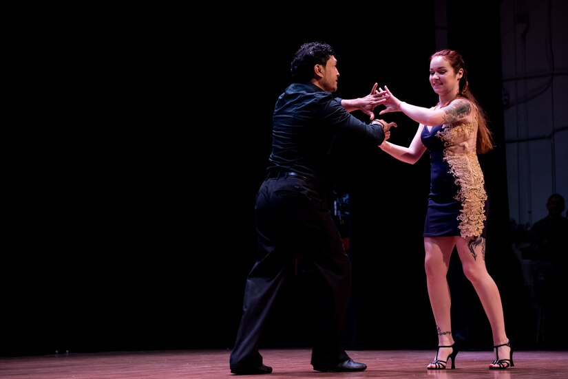 Dancers from The Mambo Room Latin Dance Studio perform the Bachata during the 93d Signal Brigade’s Hispanic Heritage Month event in the Wylie Theater at Joint Base Langley-Eustis, Va., Sept. 22, 2016. The observance began in 1968 as Hispanic Heritage Week under President Lyndon Johnson and expanded to 31 days by President Ronald Regan. (U.S. Air Force photo by Staff Sgt. J.D. Strong II)