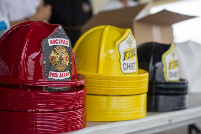 Toy fire hats are displayed to customers at the commissary on Camp Foster, Okinawa, Sept. 27, 2016. Emergency Awareness Day intends to increase the knowledge of the community by alerting people and providing them with a better understanding of the actions that need to be taken in the case of an emergency. (U.S. Marine Corps photo by MCIPAC Combat Camera Lance Cpl. Christian J. Robertson /Released)   