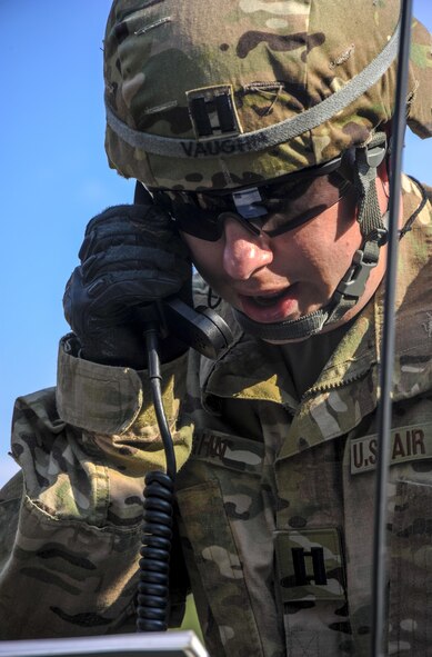 U.S. Air Force Capt. Scott Vaughn, 7th Weather Squadron current operations chief, calls in a medical evacuation helicopter during exercise Cadre Focus 16.2 in Grafenwoehr, Germany, Sept. 27, 2016. Calling in a medical evacuation was just one of the skills 7th WS Airmen practiced alongside their German and Polish counterparts during Cadre Focus 16.2. (U.S. Air Force photo by Staff Sgt. Timothy Moore)