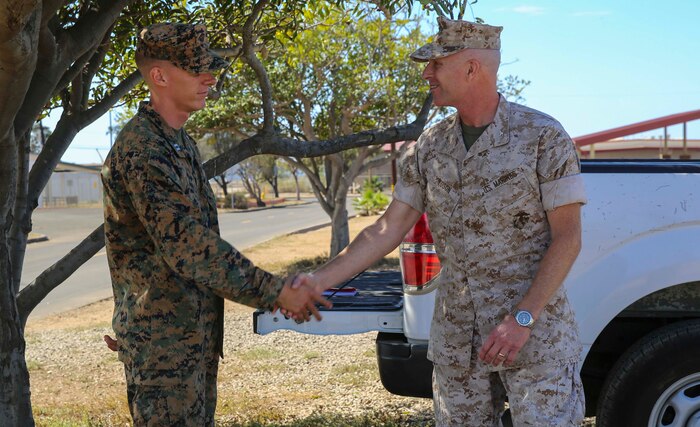 Colonel David W. Edson, Assistant Chief of Staff G-1, Marine Forces Reserve, speaks with Capt. Nicholas W. Huddleson, series commander, Mike Company, 3rd Recruit Training Battalion, during his visit to Marine Corps Base Camp Pendleton, Calif., Sept. 28. Edson Range is named after Edson’s grandfather, Maj. Gen. Merritt A. Edson.
