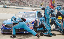 Aric Almirola, NASCAR Sprint Cup Series driver for the No. 43 Smithfield Ford, comes in for a pit stop during the Citizen Soldier 400 NASCAR Sprint Cup Series race Oct. 2, 2016, at Dover International Speedway, Dover, Del. The U.S. Air Force, one of many sponsors of the No. 43 car, started in the 27th position and finished the race in 16th place. (U.S. Air Force photo by Roland Balik)