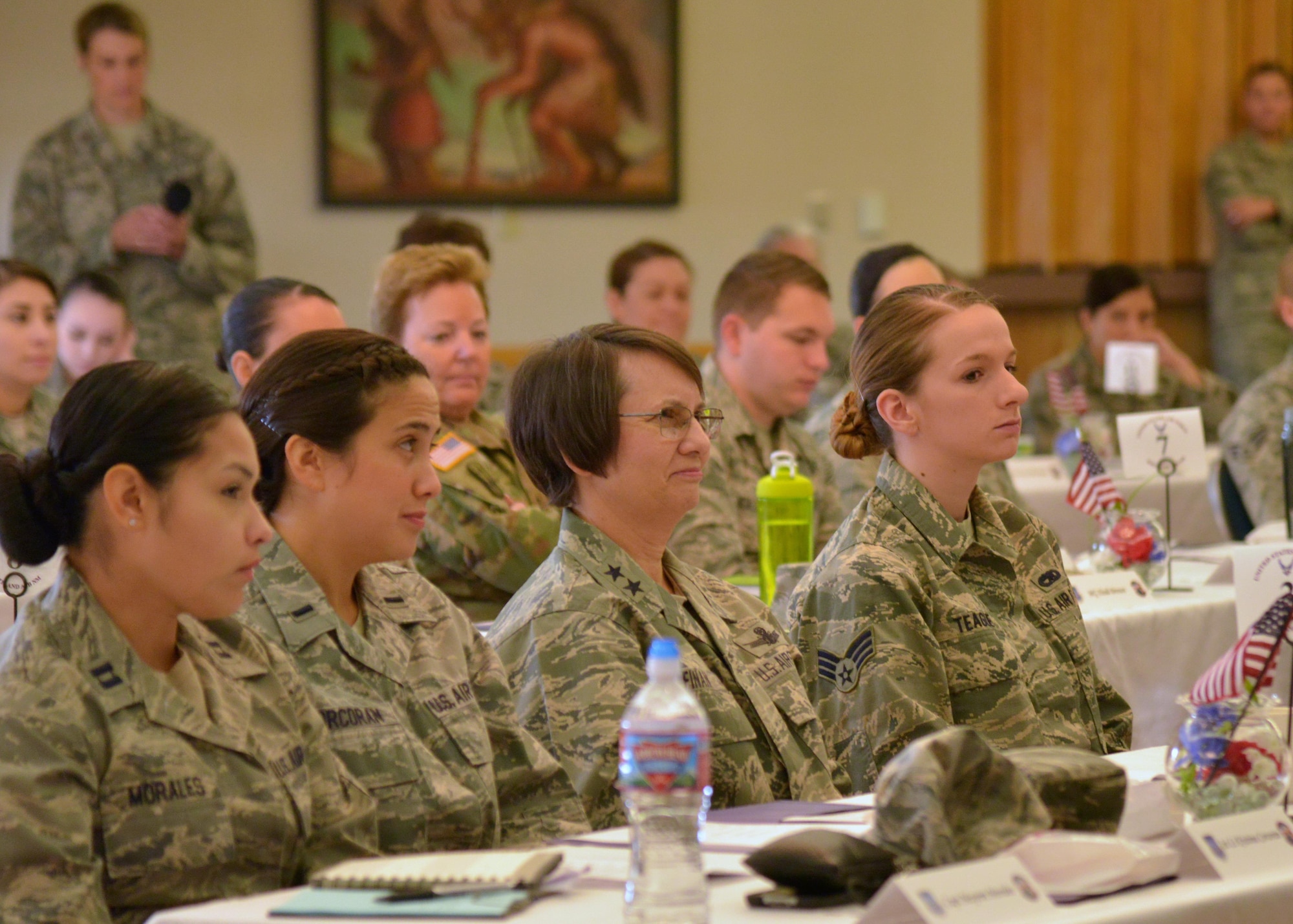 Maj. Gen. Sandra Finan, Deputy Chief Information Officer for Command, Control, Communications and Computers and Information Infrastructure Capabilities, Office of the Secretary of Defense, listens to a brief along with Airmen at the 20th Air Force Women’s Leadership Symposium at Kirtland Air Force Base, N.M., Sept. 27, 2016. During her brief, Finan stressed the importance of Airmen executing the ICBM mission to continue doing so with professionalism, skill, dedication and expertise. The three-day event supports 20th AF’s goal to coach, train and mentor nuclear professionals and leaders, while developing a nuclear command environment that fosters understanding, respect and the support necessary for people to thrive. (U.S. Air Force photo by Jamie Burnett)