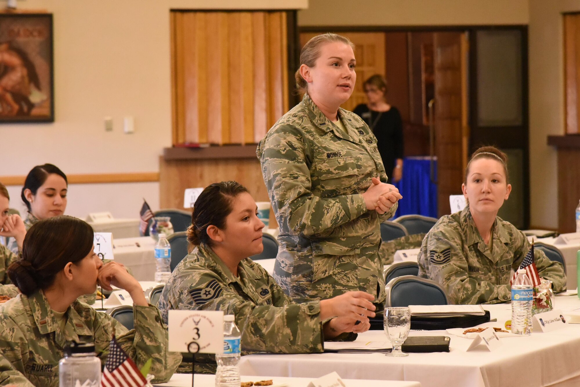 1st Lt. Annabel Monroe, 341st Missile Wing Public Affairs officer, asks a questions during a panel discussion at the second 20th Air Force Women’s Leadership Symposium at Kirtland Air Force Base, N.M., Sept. 28, 2016. Both men and women attended this year and gained insight into career decisions and lessons learned from top military leaders. The three-day event supports 20th AF’s goal to coach, train and mentor nuclear professionals and leaders, while developing a nuclear command environment that fosters understanding, respect and the support necessary for people to thrive. (U.S. Air Force photo by Ken Moore)