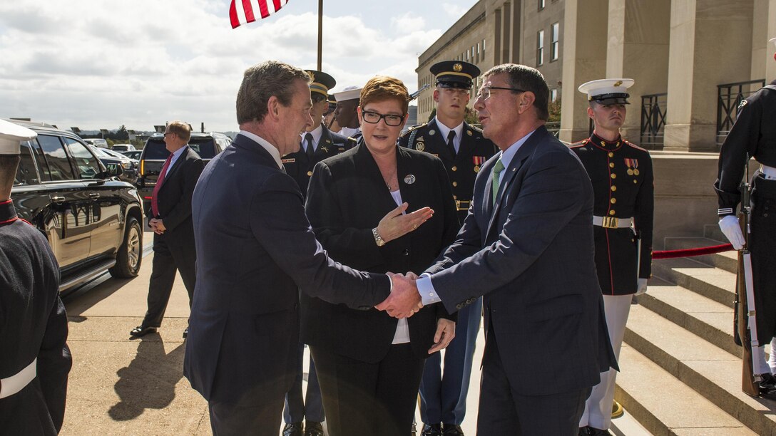 Defense Secretary Ash Carter, right, greets both Australian Defence Minister Marise Payne, center, and Christopher Pyne, the country's minister for defence industry, during an honor cordon at the Pentagon, Oct. 5, 2016. The leaders met to discuss matters of mutual importance. DoD photo by Army Sgt. Amber I. Smith

<br/><br /><a target="_blank" href="https://www.flickr.com/photos/secdef"> Click here to see more images on Secretary Carter's Flickr page. </a>
