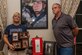 Kathryn and Paul Bredlau, parents of deceased U.S. Army Spc. Joshua Bredlau stand by photos of their son at their home in Gloucester, Va., Sept. 19, 2016. Joshua was a combat medic in the Army when he lost his life in a tragic car accident after returning home from a tour in Iraq. (U.S. Air Force photo by Airman 1st Class Derek Seifert)
