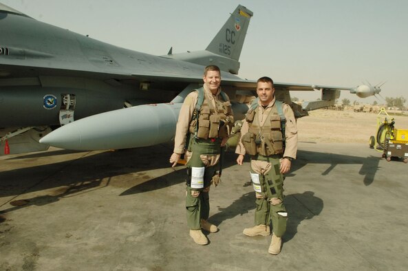 Maj. Troy Gilbert stands beside Gen. Robin Rand, the Air Force Global Strike Command commander, in front of the F-16 Fighting Falcon he was flying Nov. 27, 2006, when he was killed 30 miles southwest of Balad Air Base, Iraq. Gilbert served under Rand’s command in the 332nd Air Expeditionary Wing at Balad AB in 2006. (Courtesy photo/Gilbert family)