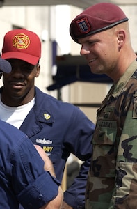An 82nd Airborne Division soldier works with USS Iwo Jima sailors to pump out the basement of a hospital flooded by Hurricane Katrina in New Orleans in 2005. The U.S. military is ready to provide help to U.S. communities when confronted by disaster, Army Lt. Gen. Jeffrey S. Buchanan, commander of U.S. Army North, said at a Defense Writers’ Group event in Washington, D.C., Oct. 5, 2016. Army photo
